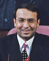 Dr. Adil Emecan